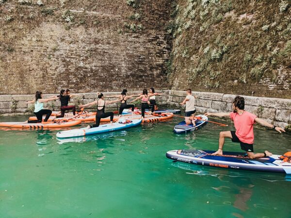 event-Tour in SUP con Yoga tra le mura di Peschiera del Garda