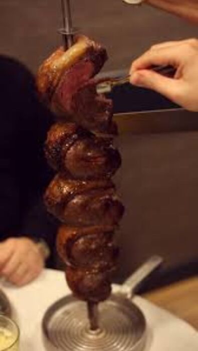 Cena in churrascaria: un viaggio di sapori Cena in churrascaria: un viaggio di sapori desktop picture